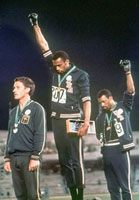 Tommie Smith (gold medal) and John Carlos (bronze medal) famously performed the Black Power salute on the 200 m winners podium at the 1968 Olympics.