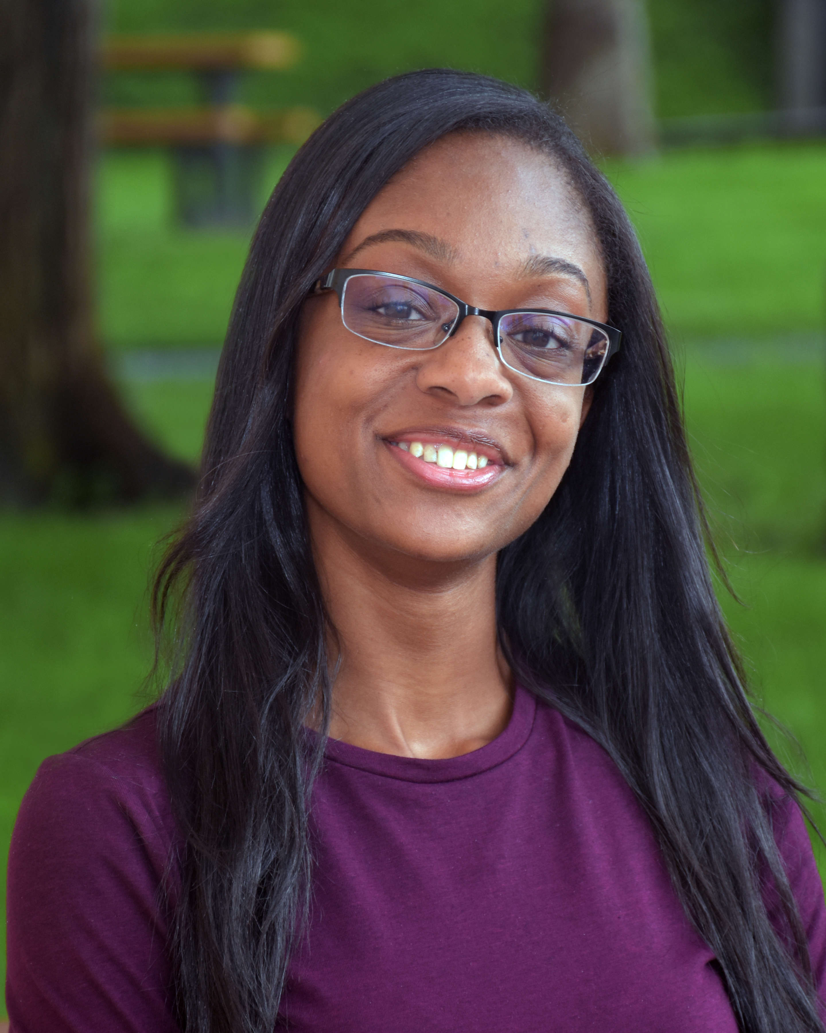 Headshot of Dr. Arnetta Fletcher looking into the camera