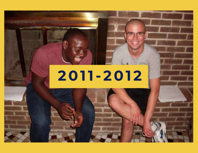 yellow background, in the center is two students laughing in front of a fire place, and in the center reads "2011-2012"