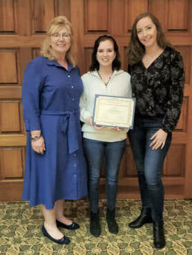 Photos of Theresa Baker receiving Veterans Upward Bound award.