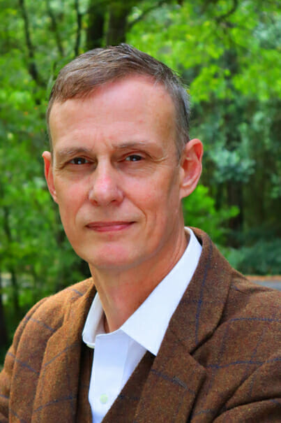 Headshot of Ernest Dollar.