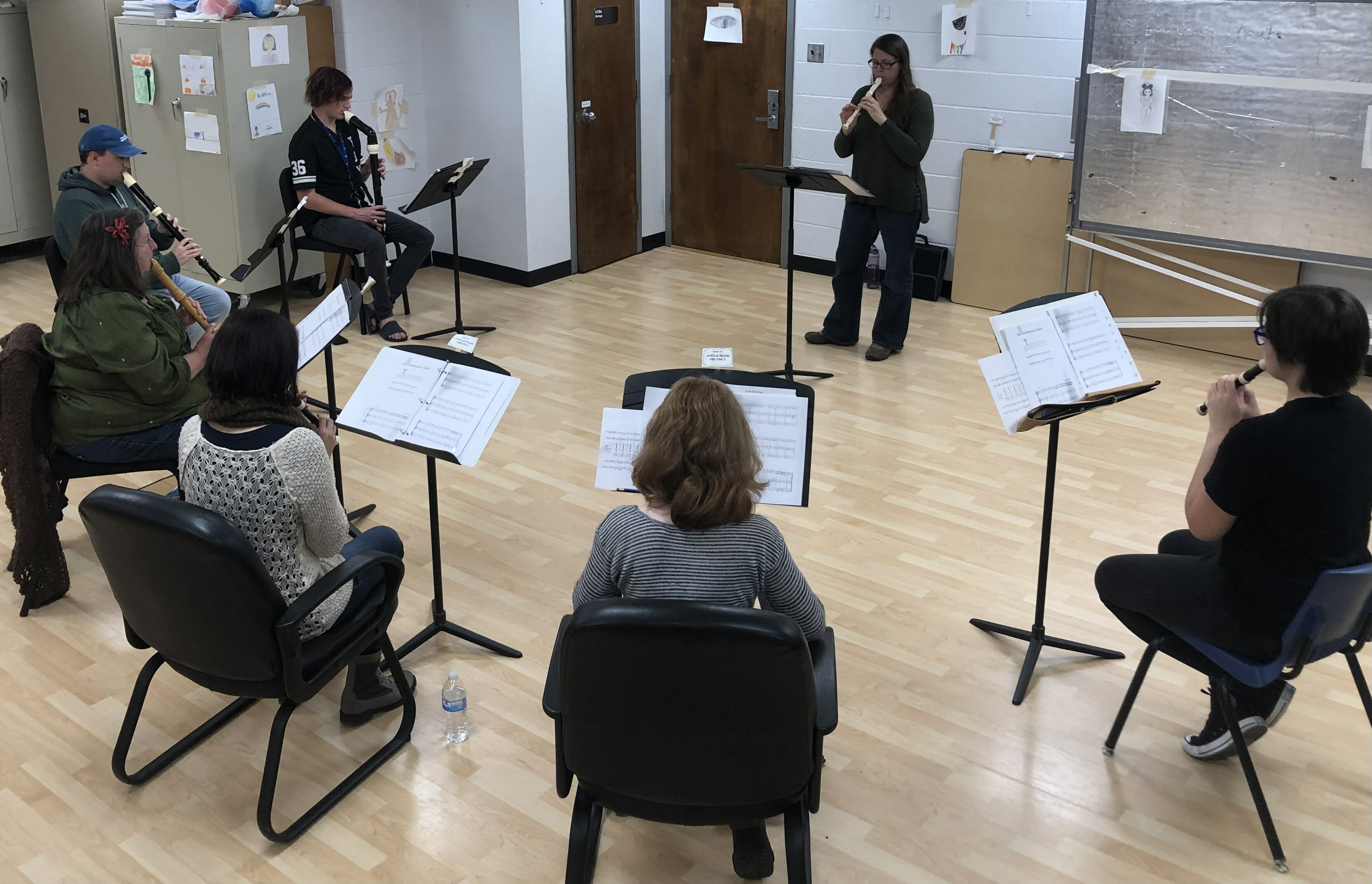 A photo of the recorder ensemble practicing in a room in the Frank Arts Center.