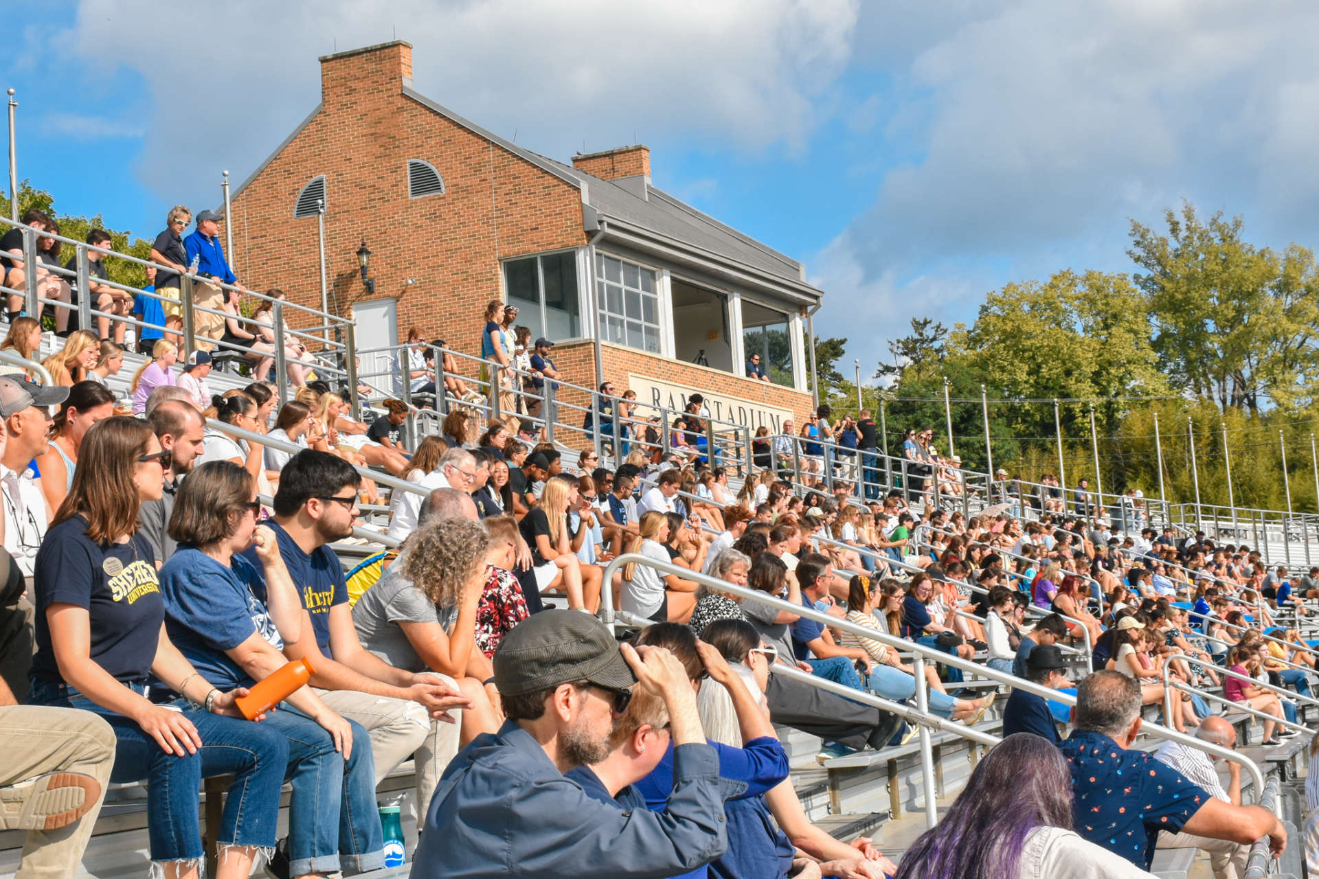 Photo of students and faculty sitting in Ram Stadium during convocation.