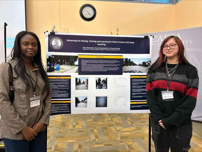 Tracy Nyamnjoh and Taruna Suryawanshi presenting their research.