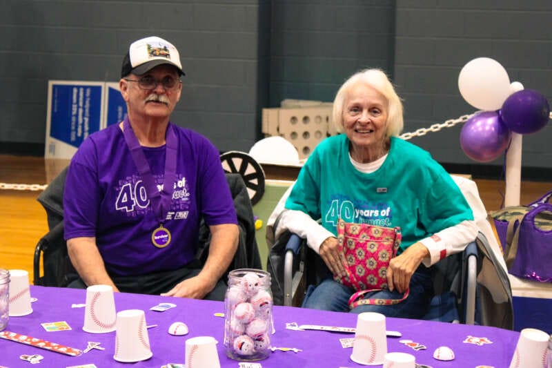 A man and woman sitting at a table