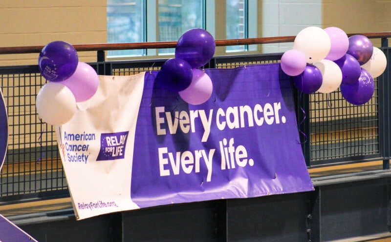 A sign that reads "Every Cancer. Every Life."